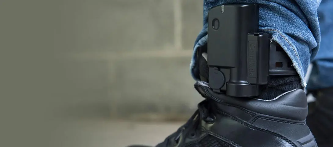 Omnilink OM500 ankle monitor worn on ankle